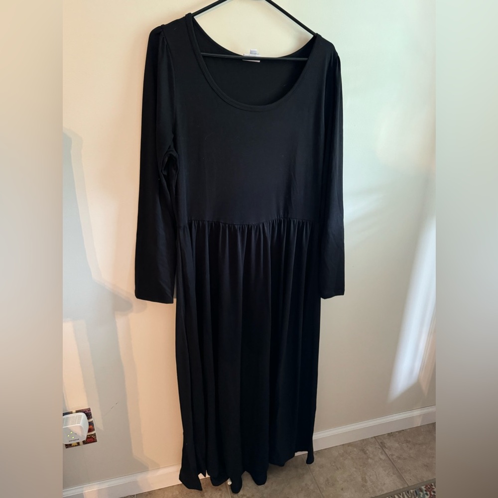 Lularoe Ryane empire waist dress with high low hem.